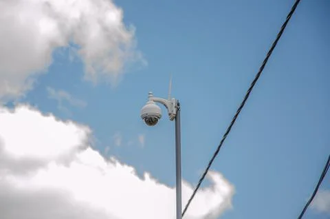 CCTV surveillance security camera video equipment on pole outdoor building sa Stock Photos