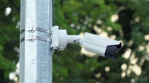 CCTV video camera on a lamppost Stock Footage 140819382