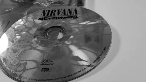 CD and album cover of Nevermind by Nirvana Stock Footage 313193069