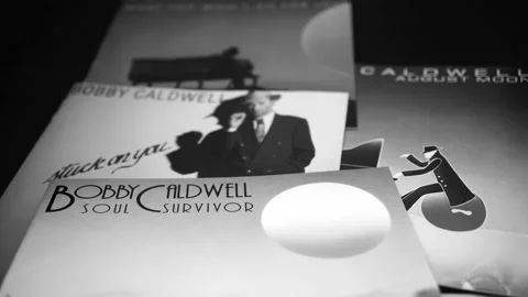 CD and artwork of American singer-songwriter, multi-instrumentalist and com.. Stock Footage 236655805