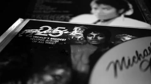 Cd and artwork of the edition for the 25th anniversary of Michael Jackson's T Stock Footage 203852023
