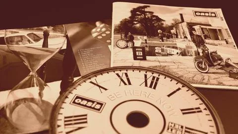 Cd and artwork of the greatest hits of the 90s cult band OASIS Stock Photos