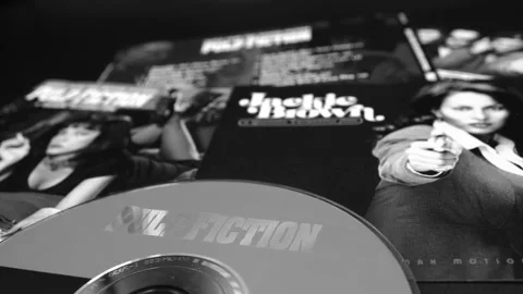 CD and artwork of OST of the films PULP FICTION and JAKIE BROWN Stock Footage 229868211