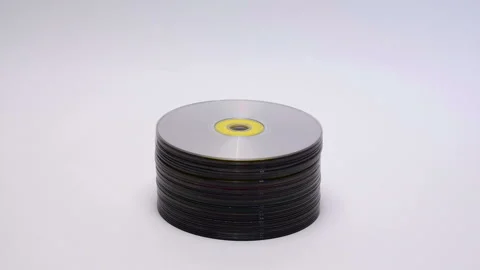 CD and DVD discs. Stack of compact discs on white background Stock Footage 125639600
