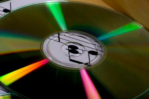 Cd and musical notes Stock Photos