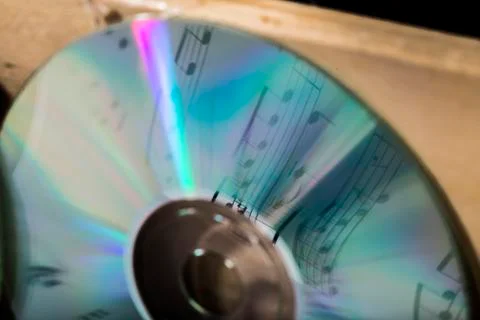 Cd and musical notes Stock Photos