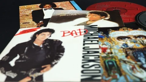 CD covers of  the first four solo albums by MICHAEL JACKSON Stock Footage 116910353