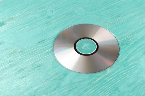 CD disk on wooden table Foto stock
