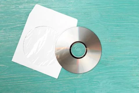 CD disk on wooden table Foto stock