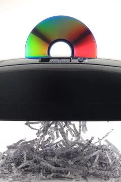 Cd / dvd shredding into binary data Stock Photos