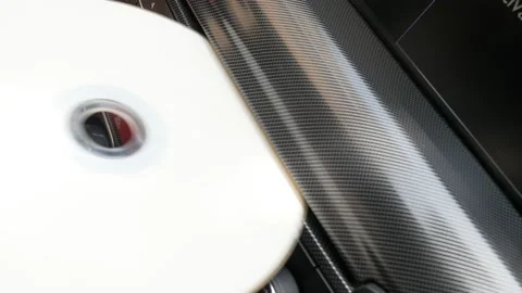 CD inserting into car music player close-up 4K footage Stock Footage 95837578