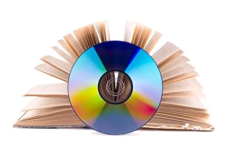 Cd on an open book Foto stock