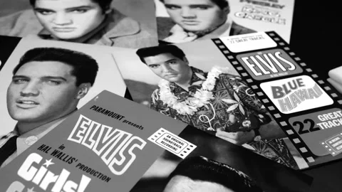 Cd of Paramount films by Elvis Presley. Nicknamed The King of Rock and Roll Stock Footage 220684176