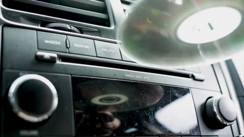 CD player in car putting on some music. Car stereo system. Vídeos de archivo 310816242