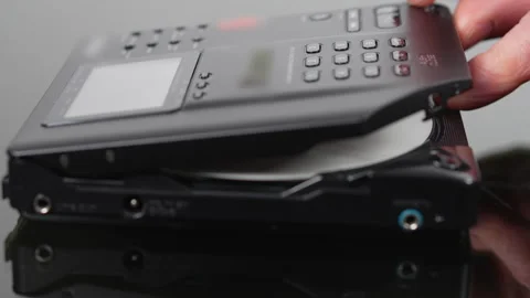 CD is removed from portable cd player Stock Footage 334572062