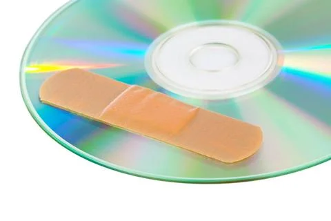 CD with software patch CD with software patch isolated on white background... Stock Photos
