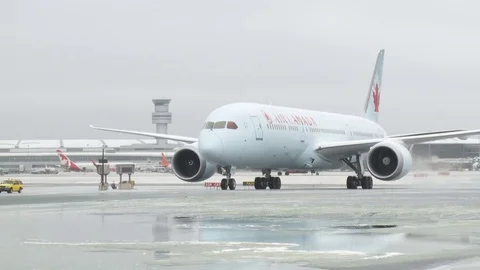 CDF 15 Air Canada Boeing 777 Waiting Stock Footage 77109620