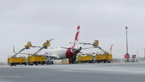 CDF 15 Air Canada Rouge 767 - Day - MWS from Rear Trucks Deicing Stock Footage 76958387