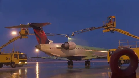 CDF 15 Delta Regional Jet Tail De Ice WS Stock Footage 76957816