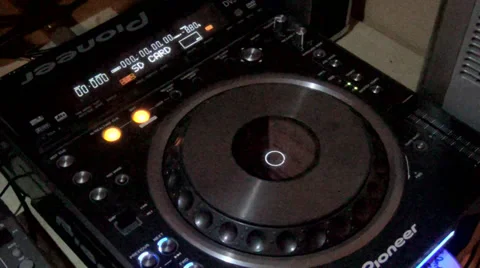 CDJ turns on and starts playing a CD Stock-Footage 38378974