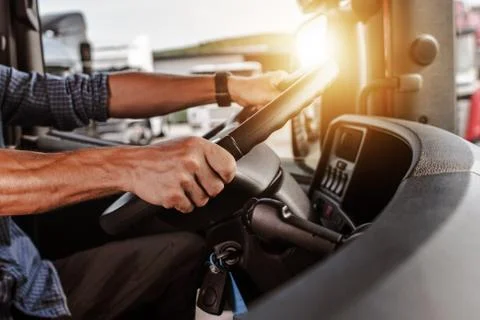 CDL Commercial Driver Inside of His Truck. Transportation Industry Theme. Stock-Fotos