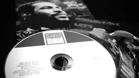 CDs and artwork of American singer, songwriter and record producer MARVIN GAY Stock Footage 201341680