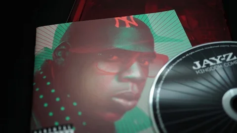 CDs and artwork of JAY-Z. rapper, entrepreneur, American record producer Video stock 116444181