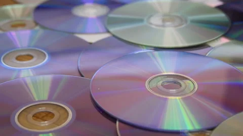 CDs and DVDs On the Table Stock Footage 41499018
