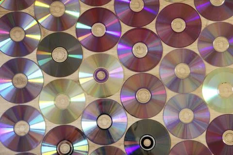 CDs pattern. Attributes of the 1990s. Memory entries. Video memory recording. Stock Photos