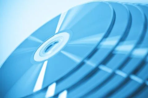 CDs in stack. Useful as a background. Stock Photos