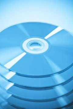 CDs in stack. Useful as a background. Stock Photos