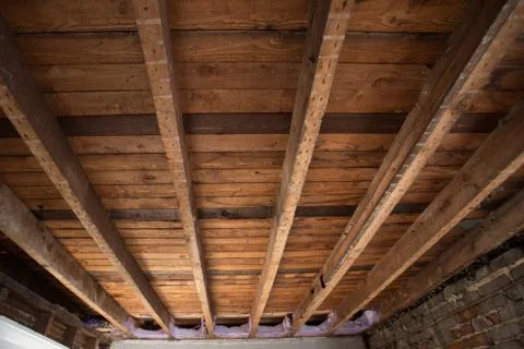 Cedar ceiling beams from a 100 year old Victorian house. Stock Photos