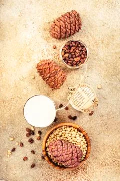 Cedar nut milk, beige table background. Non dairy alternative milk. Healthy v Stock Photos
