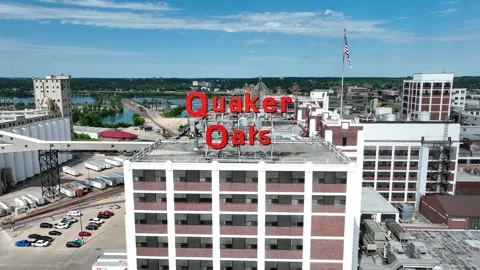 Cedar Rapids cityscape featuring Quaker Oats facility, modern buildings, Stock Footage 253802883