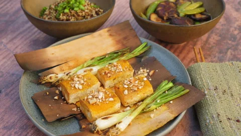 Cedar Wrapped Spice Rubbed Tofu 스톡 동영상 166534809