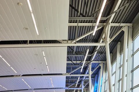 Ceiling abstract view with windows and blown out sky 스톡 사진