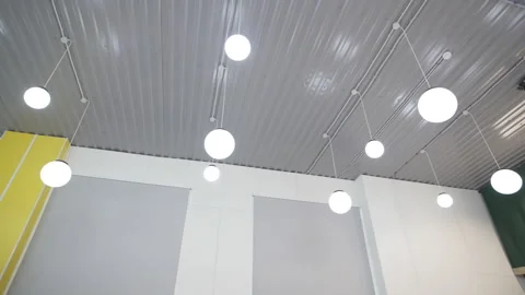 Ceiling adorned with elegant circular light fixtures Vídeo Stock 314884438