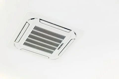 Ceiling air conditioning unit mounted on white ceiling Stock Photos
