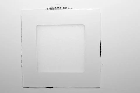 Ceiling around an LED Square Light Not Patched or Filled in Well Stock Photos