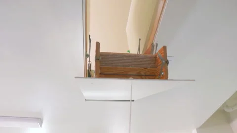 Ceiling Attic Ladder Pull Down and Return Stock Footage 244175284