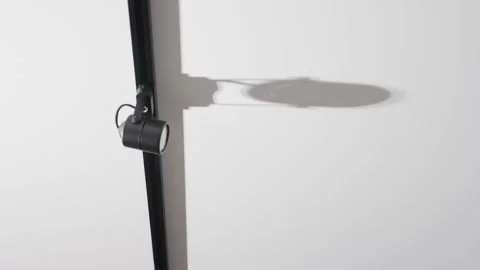 Ceiling black spotlights on a rail system on a white ceiling background Stock-Footage 192469172