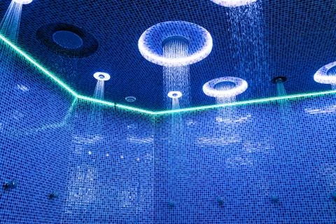 Ceiling in a blue shower room with dynamic LED lighting Stock Photos
