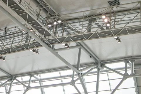 Ceiling with bright lighting in a modern warehouse, shopping center building, Stock Photos