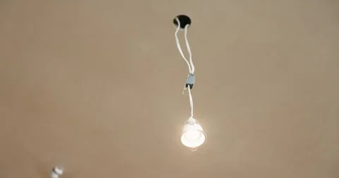 Ceiling, cable and open outlet with light for electrical work, unfinished Stock Footage 337151594