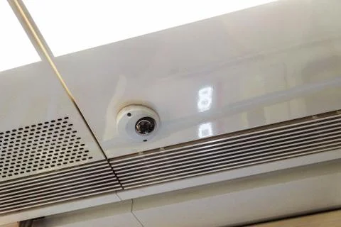 Ceiling camera security system in modern train Stock Photos