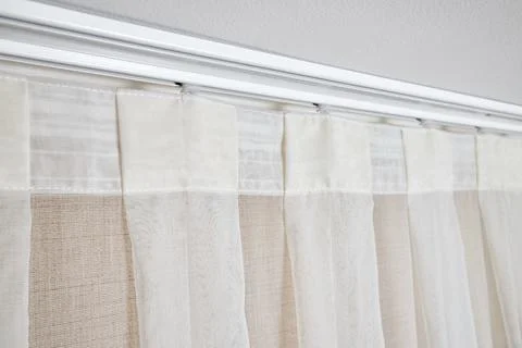 Ceiling cornice with drapes and white curtain or tulle. Interior details close Foto stock