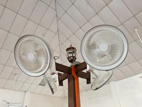 Ceiling Fan and Lantern Combo for Efficient Indoor Ventilation and Lighting Stock Photos