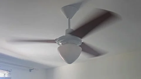 Ceiling fan being turned on in a residential setting. Stock-Footage 331300481