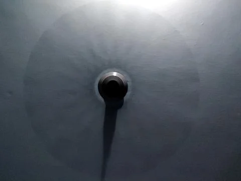 A ceiling fan in blue light Foto stock
