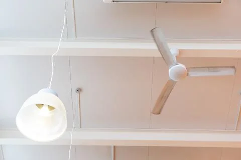 Ceiling fan in a cafe, interior ceiling fan decoration at home in hot summer, Stock Photos